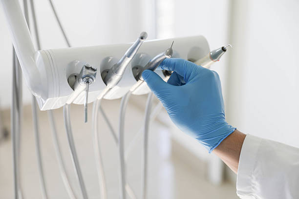Professional Tooth Extraction technician working in Bergenfield, NJ